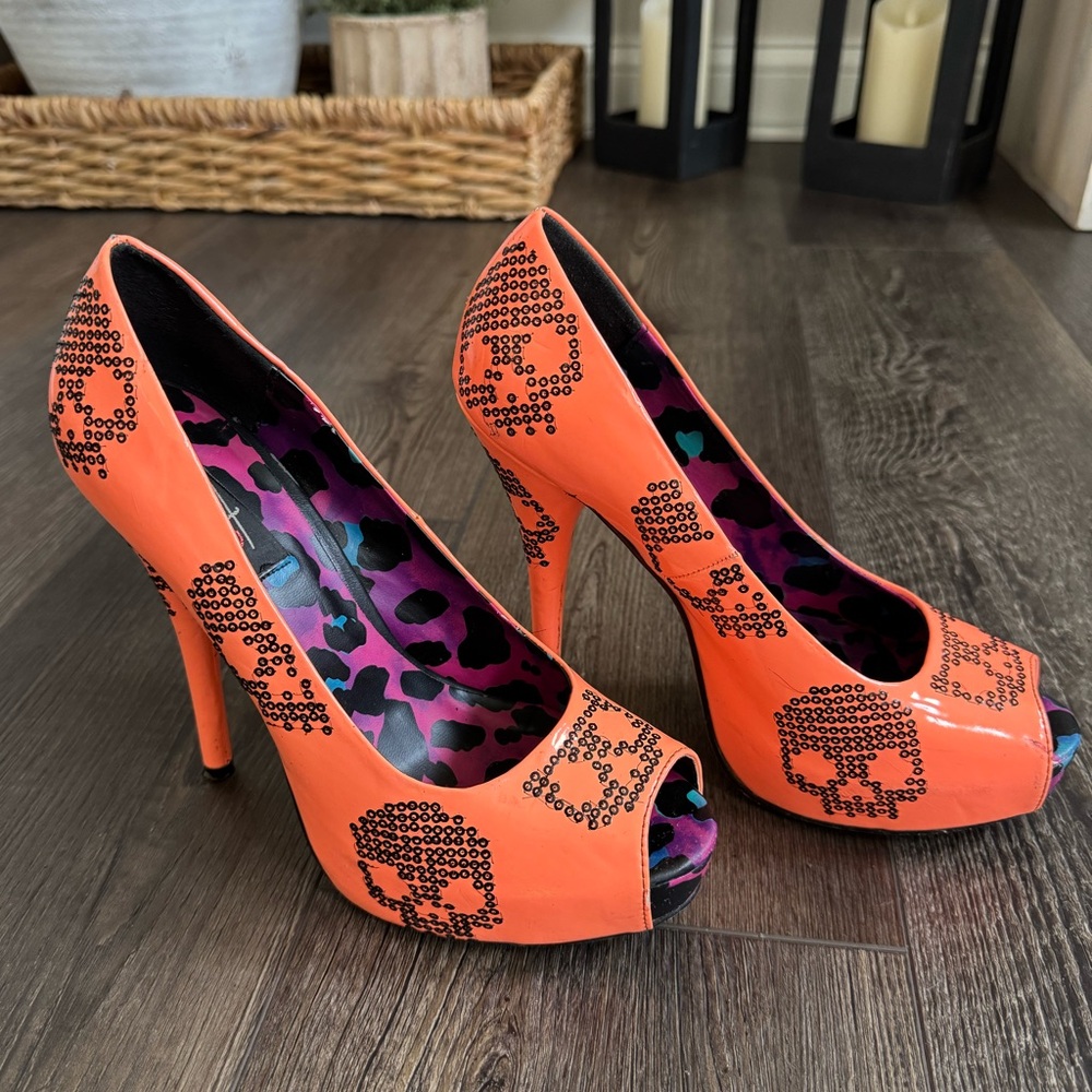 Iron Fist Peep-Toe Heels with Skull Design